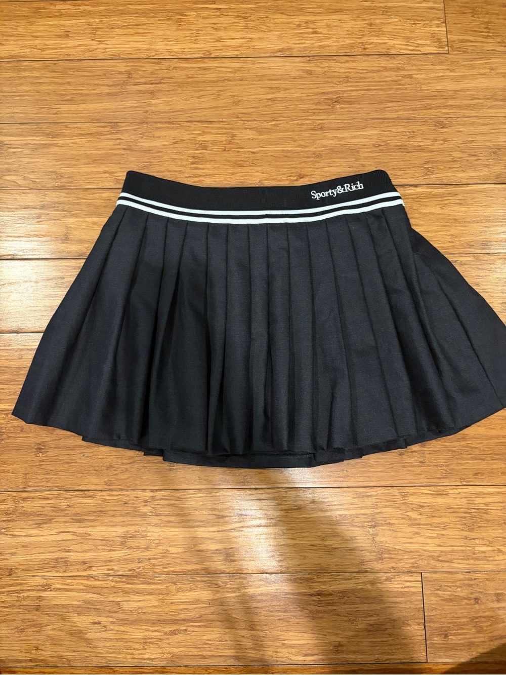 never worn Sporty & Rich Black Pleated Skater Skirt with Striped Waistband